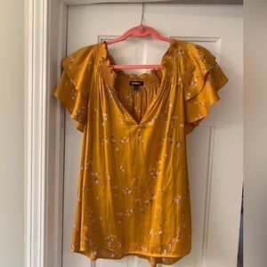 Express Gold with pink flowers flutter sleeve blouse.